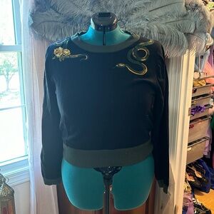 Black and green embroidered snake sweater